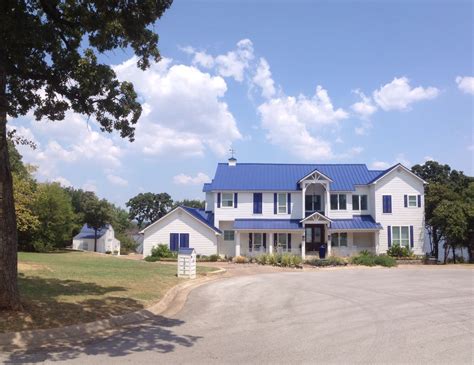 white house with blue roof